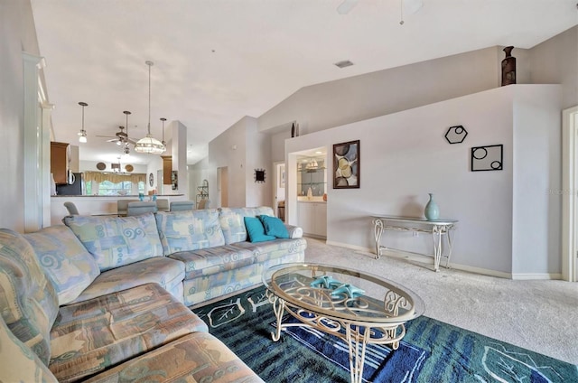 carpeted living room with lofted ceiling and ceiling fan