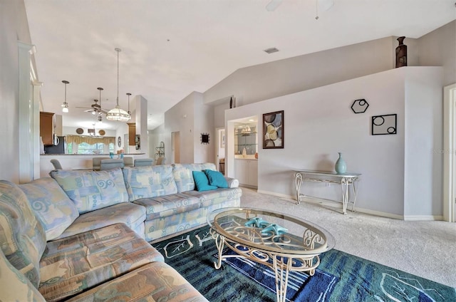 5240 Hyland Hills Ave Unit 1421, Sarasota, FL 34241 - carpeted living area with ceiling fan, vaulted ceiling, and baseboards