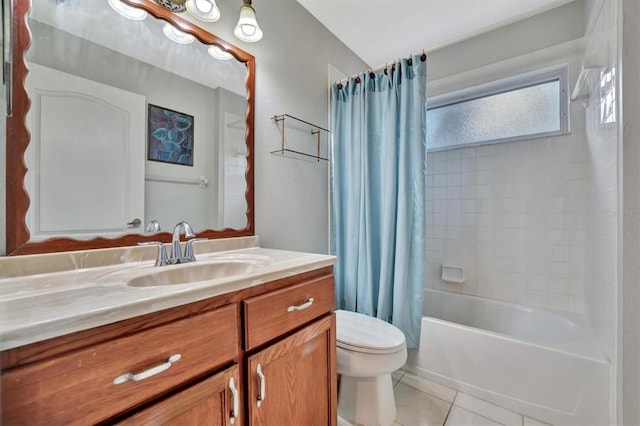 full bathroom with tile patterned flooring, vanity, toilet, and shower / tub combo