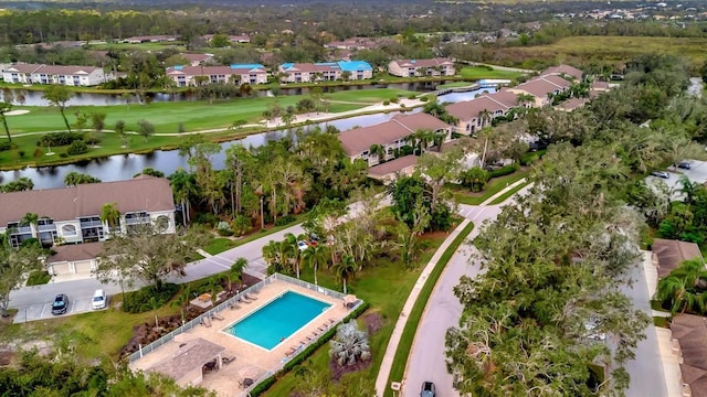 5240 Hyland Hills Ave Unit 1421, Sarasota, FL 34241 - aerial perspective of suburban area featuring a golf course, a nearby body of water, and a pool