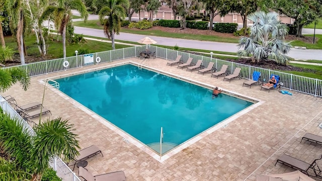 view of swimming pool with a patio area