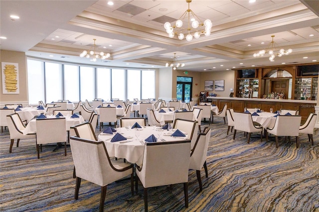 carpeted dining space featuring ornamental molding, plenty of natural light, and coffered ceiling