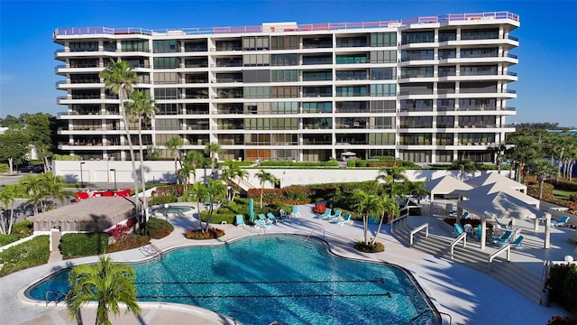 view of swimming pool with a patio area