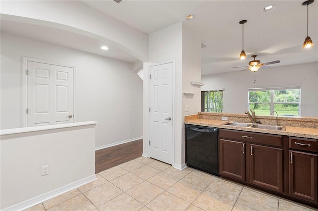 kitchen with dishwasher, dark brown cabinets, sink, and light tile patterned floors