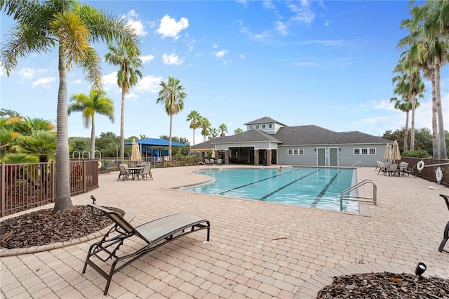 view of pool featuring a patio