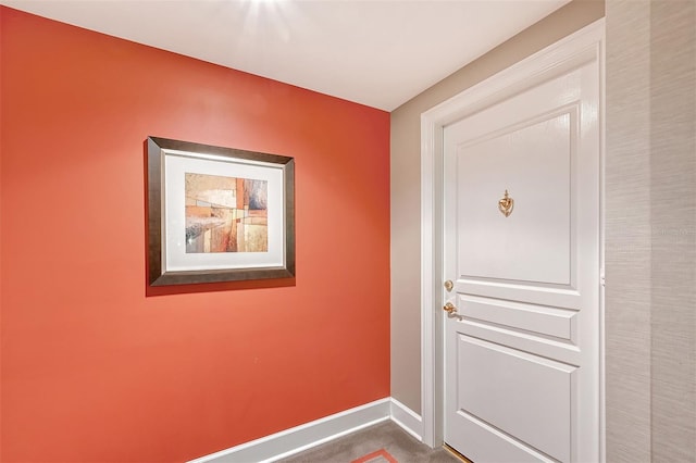 entryway featuring carpet flooring