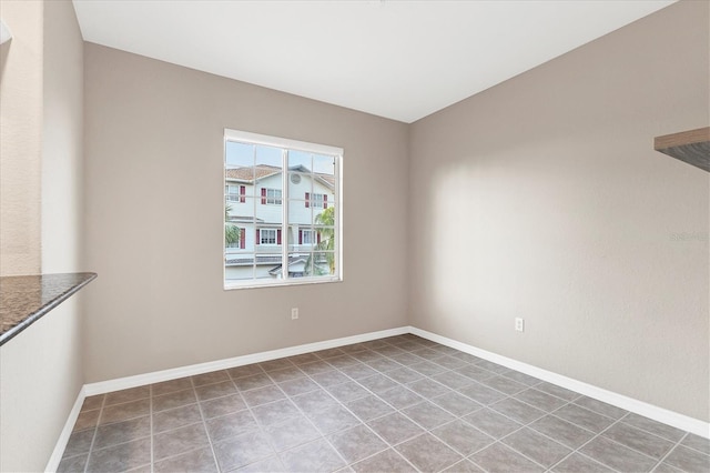 unfurnished dining area with tile patterned floors