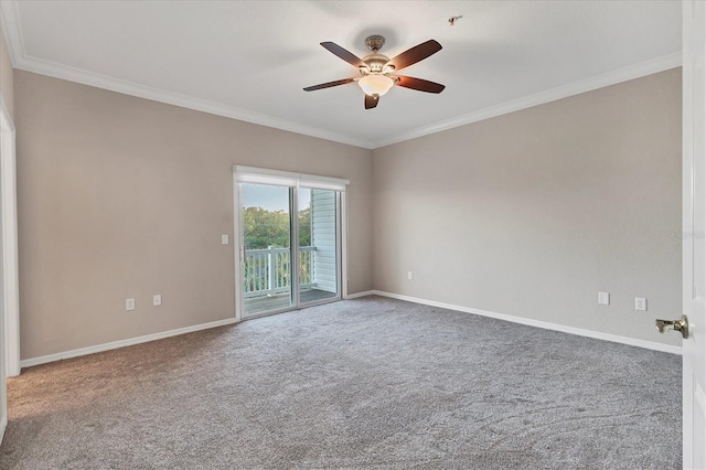 unfurnished room with ornamental molding, ceiling fan, and carpet floors