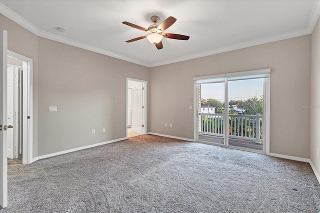 empty room featuring carpet flooring, ceiling fan, and ornamental molding