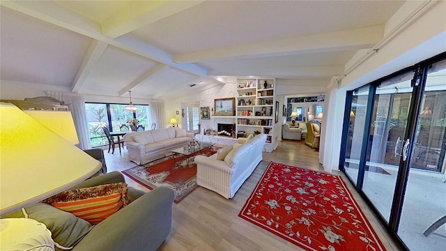 living room with vaulted ceiling with beams and wood-type flooring