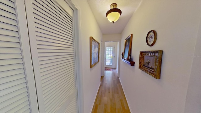 hall featuring light hardwood / wood-style flooring