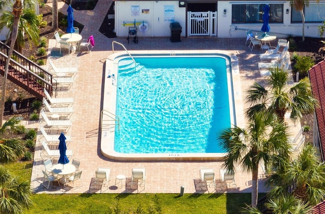 view of pool featuring a patio area