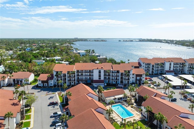 bird's eye view with a water view