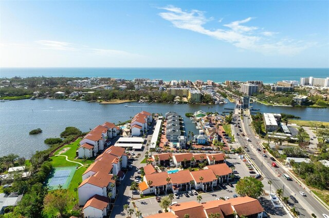 bird's eye view with a water view