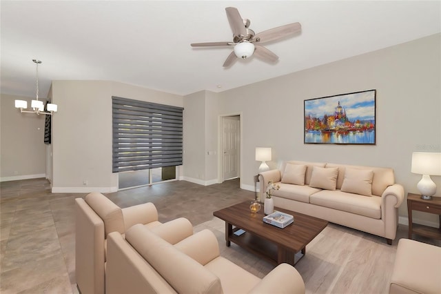 10550 Old Grove Cir, Bradenton, FL 34212 - living area with a chandelier, a ceiling fan, and baseboards