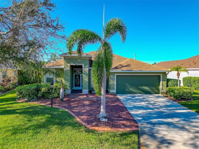 10550 Old Grove Cir, Bradenton, FL 34212 - view of front of house with driveway, an attached garage, stucco siding, and a front lawn