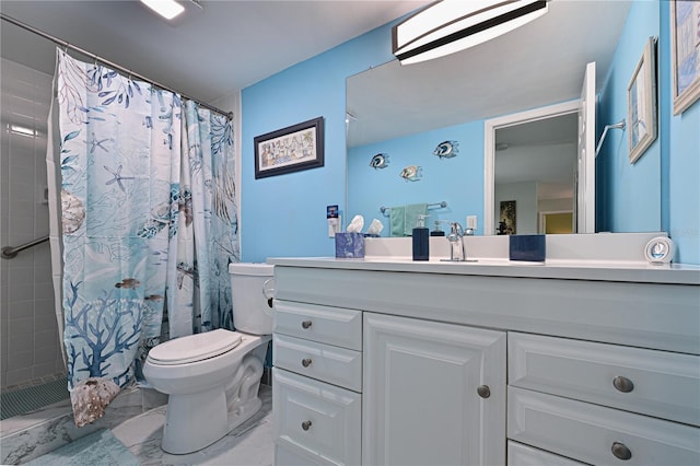 bathroom with vanity, toilet, and a shower with shower curtain