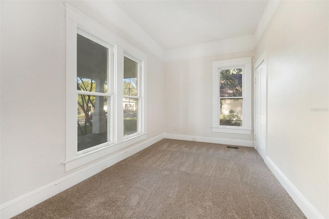 unfurnished room featuring carpet floors