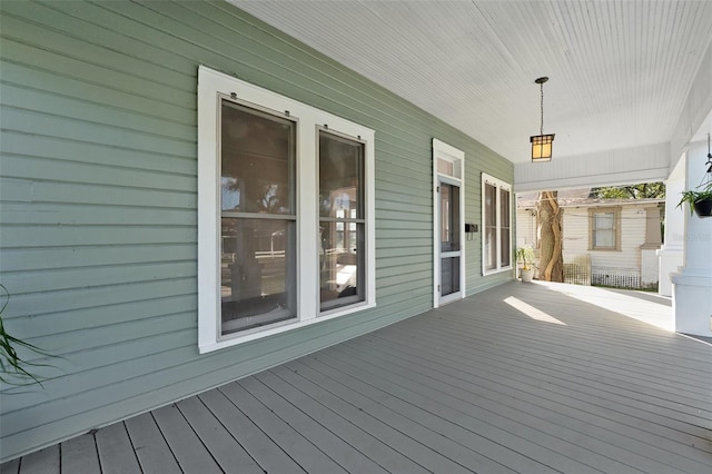 wooden terrace featuring a porch