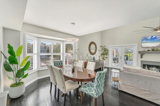 dining space featuring french doors, dark hardwood / wood-style floors, plenty of natural light, and ceiling fan