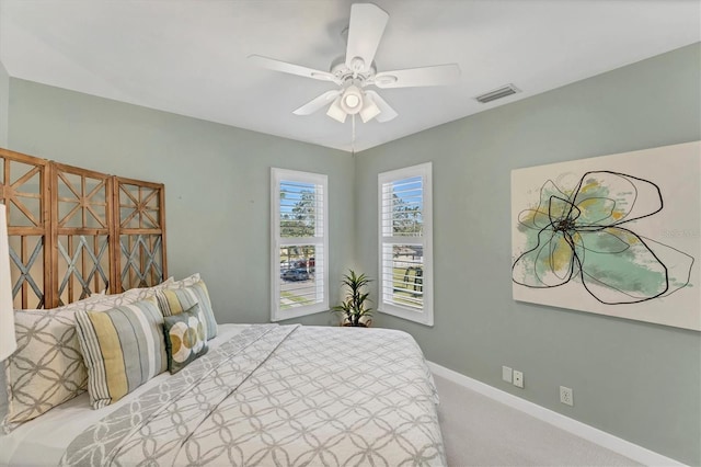 carpeted bedroom featuring ceiling fan