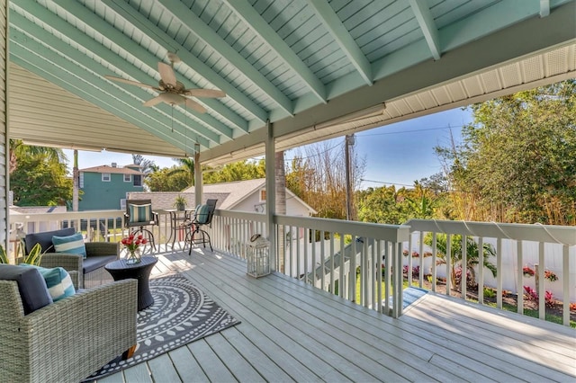 wooden deck featuring ceiling fan and an outdoor hangout area