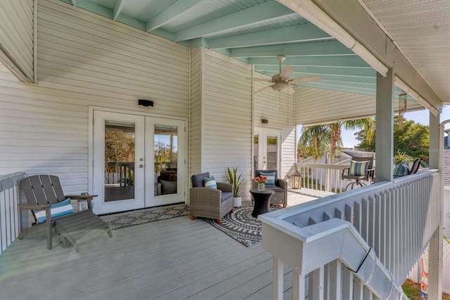 wooden terrace with french doors and ceiling fan