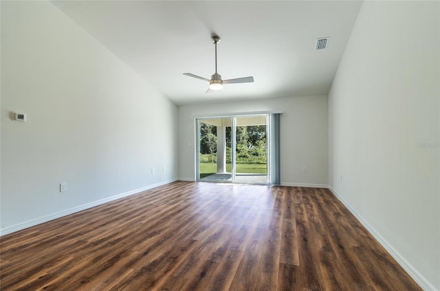 unfurnished room with dark wood-type flooring and ceiling fan