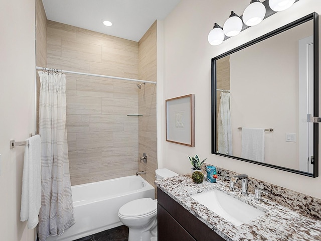 full bathroom featuring shower / tub combo, vanity, and toilet