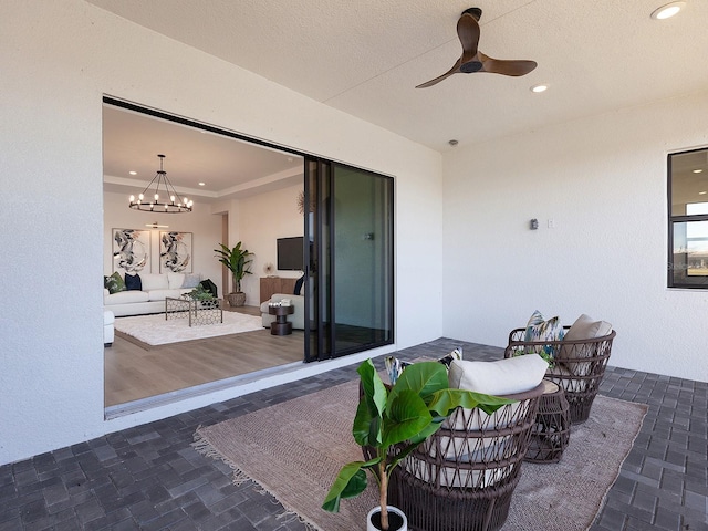 view of patio / terrace featuring ceiling fan