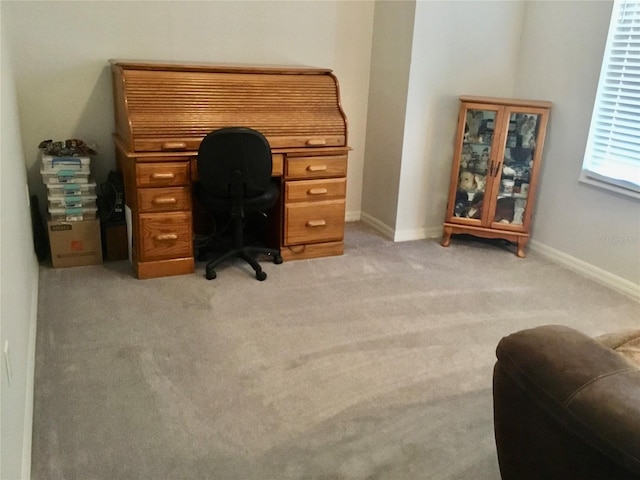 home office featuring light colored carpet