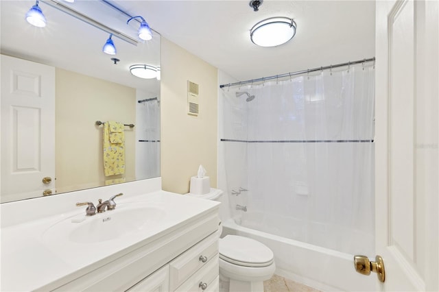 full bathroom featuring tile patterned floors, vanity, toilet, and shower / bath combination with curtain