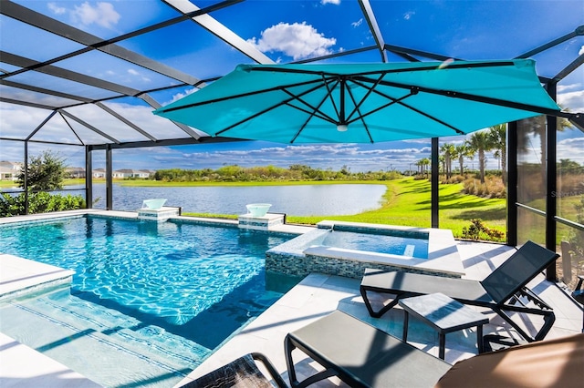 view of swimming pool with glass enclosure, an in ground hot tub, a patio area, and a water view