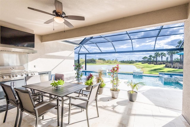 view of patio / terrace featuring a lanai, ceiling fan, and an outdoor kitchen