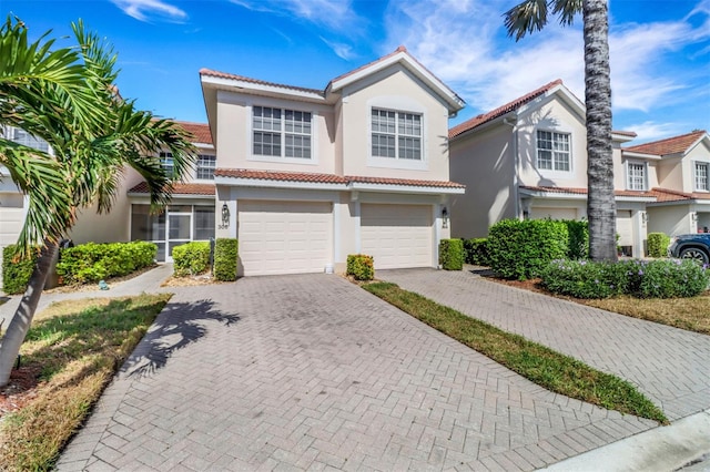 view of front of home with a garage