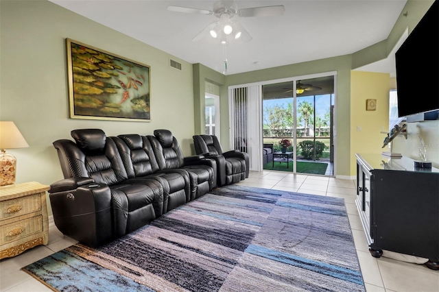 tiled living room with ceiling fan