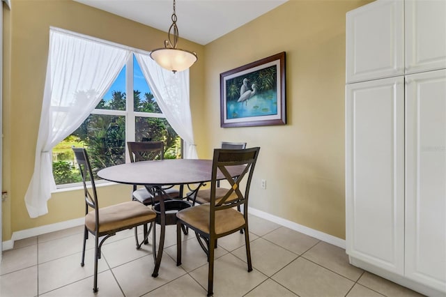 dining room with light tile patterned floors