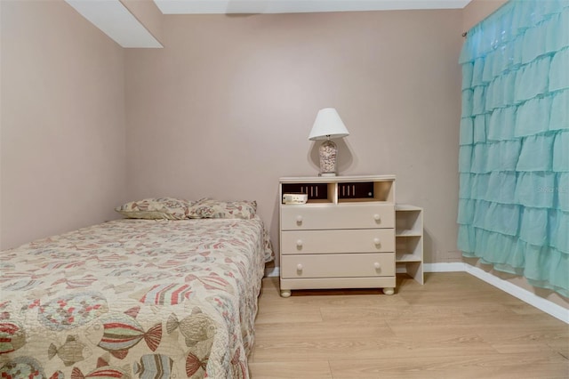 bedroom featuring light hardwood / wood-style floors