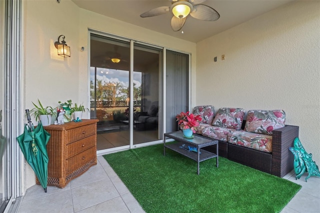 exterior space featuring ceiling fan