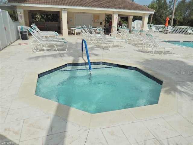 view of pool featuring a patio area