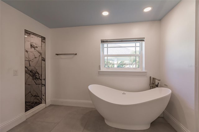 bathroom with plus walk in shower and tile patterned floors