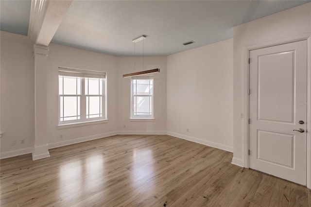 empty room featuring light hardwood / wood-style floors