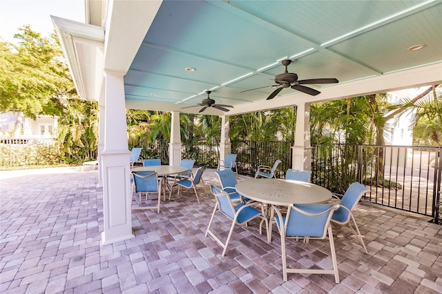 view of patio featuring ceiling fan