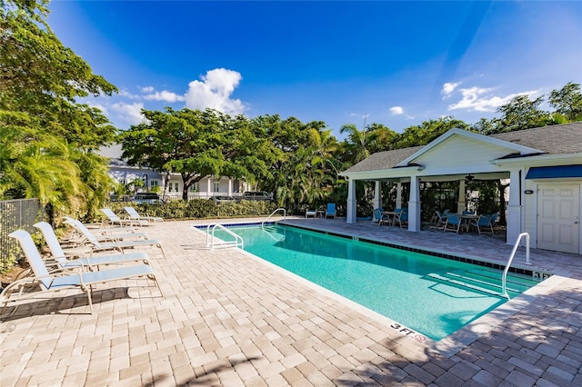 view of swimming pool featuring a patio