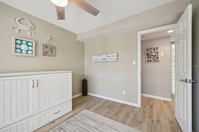 bedroom featuring light hardwood / wood-style flooring and ceiling fan