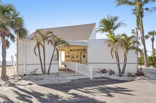 view of front of home featuring a water view