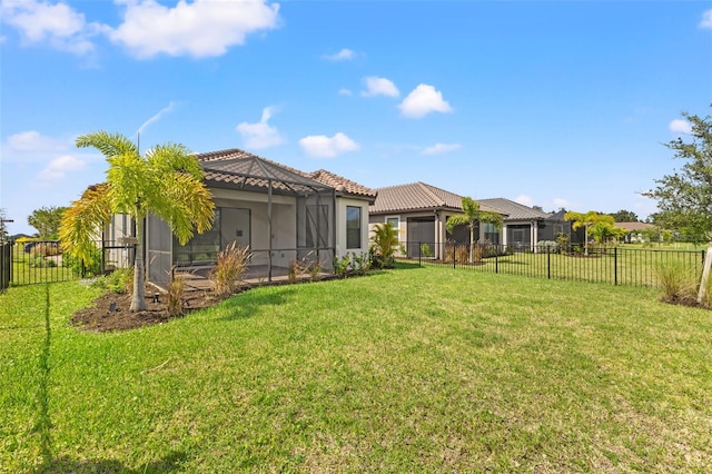 view of yard featuring a lanai