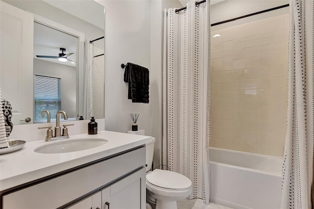 full bathroom featuring shower / bath combo, vanity, ceiling fan, and toilet