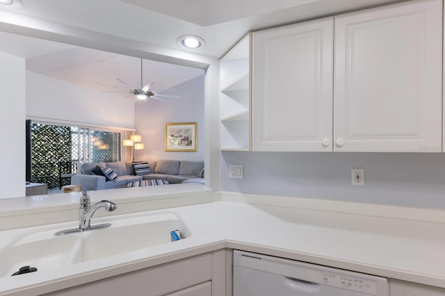 kitchen featuring white cabinets, dishwasher, ceiling fan, and sink