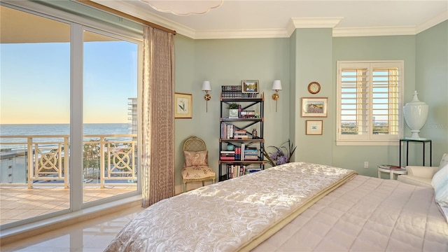 bedroom featuring access to exterior, a water view, and crown molding